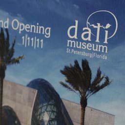 Direct mail concept Dali Museum. Exterior of mailer shows new logo and grand opening call to action.
